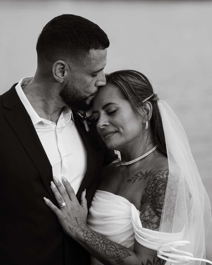 Emotional black and white wedding portrait
